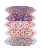 Five folded patterned hand block printed bandana scarves stacked vertically on a white background, each showing different floral and paisley designs in blue, pink, red, and purple tones.